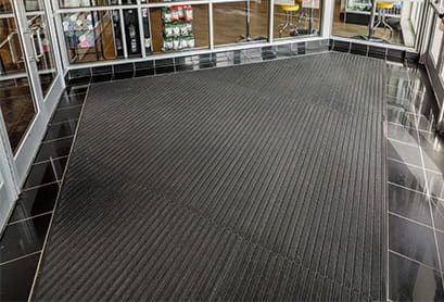 Entry Mats, Grids vs. Carpet Tiles